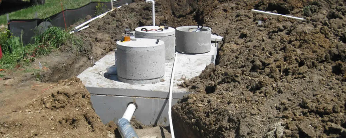 Septic system repair and installation site with tank access ports in Billings, MT